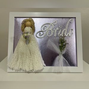 Handmade macrame doll frame